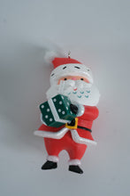 Load image into Gallery viewer, Hallmark Keepsake 2024 “What a Gift!” Santa Ornament – Limited Edition by Tammy Haddix