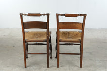 Load image into Gallery viewer, Pair of Antique Rush Seat Ladder Back Dining Chairs with Turned Legs