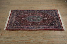 Load image into Gallery viewer, Hand Woven Persian Style Central Medallion Wool Area Rug 34 x 60 Red Blue Octagonal Design