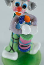 Load image into Gallery viewer, Hand-Blown Art Glass Clown Figurine with Colorful Drum – Vibrant Circus Miniature on Green Base