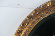 Load image into Gallery viewer, Carolina Mirror Company Round Ornate Wall Mirror – Gold Scroll Resin Frame – 26" x 32.5"