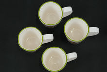 Load image into Gallery viewer, Pier 1 “Park Avenue Puppies” Mug Set – Set of 4 Ceramic Coffee Cups with Festive Dog Design & Green Rim