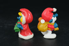 Load image into Gallery viewer, Vintage Christmas Smurfs – 1984 & 1987 Schleich Peyo Figures – Santa & Smurfette with Present