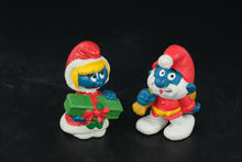 Load image into Gallery viewer, Vintage Christmas Smurfs – 1984 & 1987 Schleich Peyo Figures – Santa & Smurfette with Present