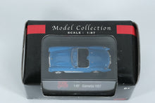 Load image into Gallery viewer, Malibu International Chevrolet Corvette (1957) – 1:87 Scale Die-Cast Model (Blue/White)