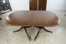 Load image into Gallery viewer, Vintage Double Pedestal Dining Table with Brass Casters and Two Leaves