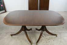 Load image into Gallery viewer, Vintage Double Pedestal Dining Table with Brass Casters and Two Leaves