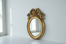 Load image into Gallery viewer, Gold Gilt Oval Wall Mirror Ribbon Bow Frame Hollywood Regency Style