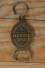 Load image into Gallery viewer, Guinness Nitro IPA Keychain Bottle Opener – Vintage Brass-Tone – St. James’s Gate Dublin