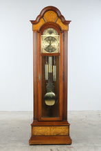 Load image into Gallery viewer, Howard Miller Triple Chime Grandfather Clock with Moving Moon Dial