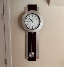 Load image into Gallery viewer, Howard Miller Bergen Wall Clock Modern Pendulum 35 Inch Metal Wood