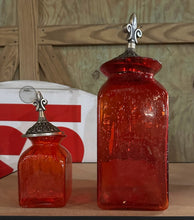 Load image into Gallery viewer, Pair Red Glass Apothecary Jars Lidded Decorative Bottles Fleur De Lis Finials