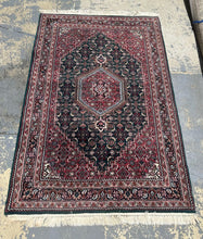 Load image into Gallery viewer, "Sultan’s Hexagon" Hand-Knotted Wool Rug – 70"x47" Hunter Green & Watermelon Red