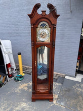 Load image into Gallery viewer, Howard Miller Grandfather Clock – Traditional Cherry Finish with Brass Dial & Pendulum