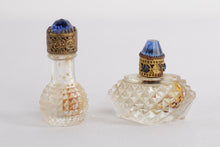 Load image into Gallery viewer, Pair of Vintage Cut Glass Perfume Bottles with Ornate Jeweled Blue Stoppers – Vanity Collectible