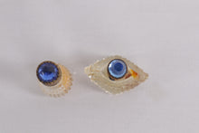 Load image into Gallery viewer, Pair of Vintage Cut Glass Perfume Bottles with Ornate Jeweled Blue Stoppers – Vanity Collectible