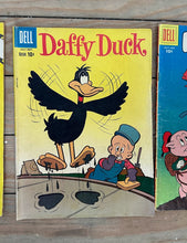 Load image into Gallery viewer, Lot of 4 Vintage Dell Looney Tunes Comics — Porky Pig, Daffy Duck & Looney Tunes (1950s–1960s) | Classic Warner Bros. Characters