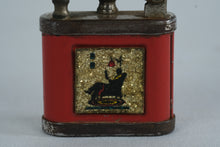 Load image into Gallery viewer, Girey Lift Arm Petrol Lighter, Red Enamel with Seated Figure & Lamp Motif
