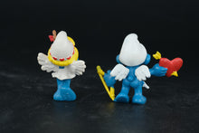 Load image into Gallery viewer, Vintage Cupid Smurfs – 1981 & 1982 Peyo Bully Figures – Valentine’s Day Pair