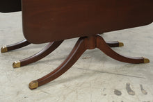 Load image into Gallery viewer, Vintage Mahogany Drop Leaf Dining Table with Triple Pedestal Brass Capped Base