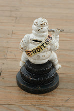Load image into Gallery viewer, Antique Michelin Man Cast Iron Coin Bank Detroit 1918 Advertising Figure