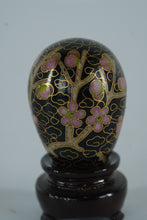 Load image into Gallery viewer, Miniature Cloisonné Egg with Pink Plum Blossom Design – Black Enamel Floral Art on Stand