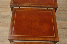 Load image into Gallery viewer, “The Wexford Trio” – Vintage Leather-Top Nesting Tables with Gold Tooling