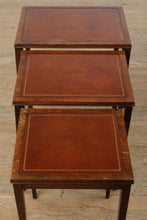 Load image into Gallery viewer, “The Wexford Trio” – Vintage Leather-Top Nesting Tables with Gold Tooling