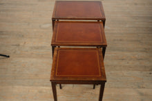 Load image into Gallery viewer, “The Wexford Trio” – Vintage Leather-Top Nesting Tables with Gold Tooling