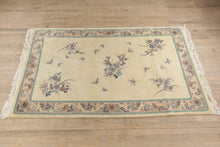 Load image into Gallery viewer, Papillon Hand Woven Wool Rug - 68" x 112"