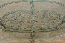 Load image into Gallery viewer, Oval Glass Top Coffee Table with Cast Metal Base and Ornate Scrollwork Frame