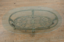 Load image into Gallery viewer, Oval Glass Top Coffee Table with Cast Metal Base and Ornate Scrollwork Frame