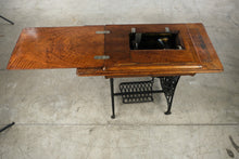 Load image into Gallery viewer, Antique Treadle Sewing Machine in Inlaid Wood Cabinet