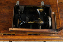 Load image into Gallery viewer, Antique Treadle Sewing Machine in Inlaid Wood Cabinet