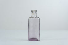 Load image into Gallery viewer, Antique Sloans Liniment Purple Amethyst Glass Medicine Bottle Embossed