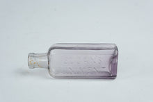 Load image into Gallery viewer, Antique Sloans Liniment Purple Amethyst Glass Medicine Bottle Embossed