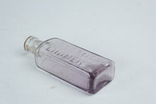 Load image into Gallery viewer, Antique Sloans Liniment Purple Amethyst Glass Medicine Bottle Embossed