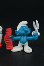 Load image into Gallery viewer, Vintage Smurfs Lot – 1970s–1980s Schleich Peyo Figures – Barber, Farmer, Gift Giver & More (Set of 6)
