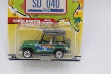 Load image into Gallery viewer, Matchbox Across America 50th Birthday Series – South Dakota Jeep Wrangler “Mount Rushmore Adventure” (SD 040)