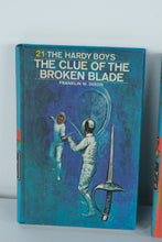 Load image into Gallery viewer, Hardy Boys Mystery Stories Lot (3 Hardcovers, 1970s Editions) – The Clue of the Broken Blade, The Bombay Boomerang, The Sign of the Crooked Arrow