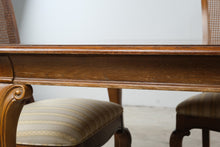 Load image into Gallery viewer, Thomasville Solid Wood Dining Table with 8 Cane Back Chairs and 2 Leaves