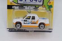 Load image into Gallery viewer, Matchbox Across America 50th Birthday Series – Utah Ford Explorer Sport Trac “Ski Patrol” (UT 045)