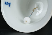 Load image into Gallery viewer, White Porcelain Christmas Bell 1973– Multilingual Holiday Message, Embossed Relief Scene, Crown Top