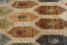 Load image into Gallery viewer, Handwoven Jute Rug – 64” x 100” – Multi-Color Tribal Motif