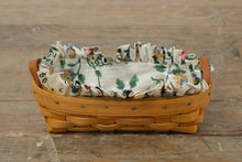 Load image into Gallery viewer, Longaberger Small Basket w/ Floral Ruffled Fabric Liner &amp; Plastic Protector – Handwoven USA (8")
