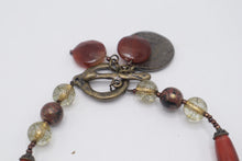 Load image into Gallery viewer, Boho Beaded Necklace Red Turquoise Tone Glass Beads Toggle Clasp Charms
