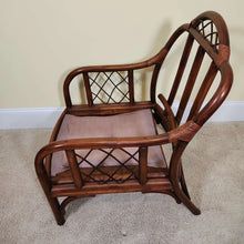 Load image into Gallery viewer, Rattan Lounge Chair with Vibrant Striped Upholstery
