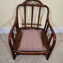 Load image into Gallery viewer, Rattan Lounge Chair with Vibrant Striped Upholstery
