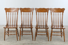 Load image into Gallery viewer, Set of Four Vintage Carved Oak Pressed Back Spindle Dining Chairs
