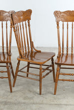 Load image into Gallery viewer, Set of Four Vintage Carved Oak Pressed Back Spindle Dining Chairs
